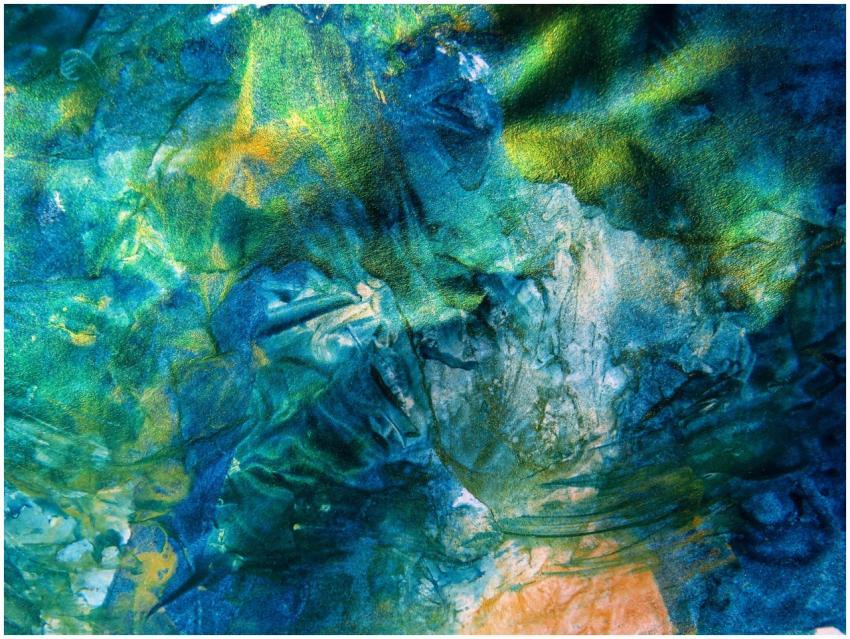Dynamic abstract art in vivid blues and greens wit
