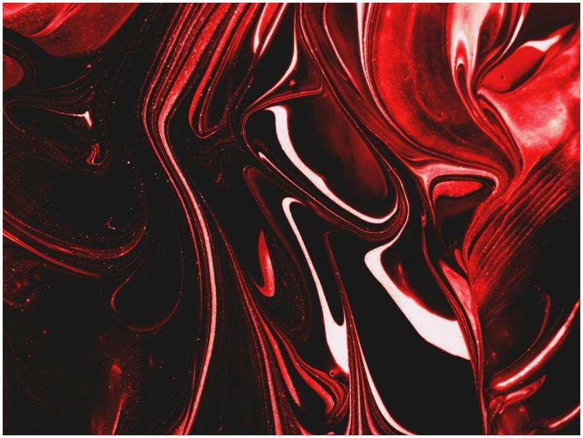 Dynamic swirls of red and black create a striking