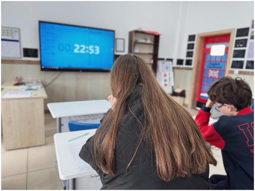 Students concentrating in a modern classroom with