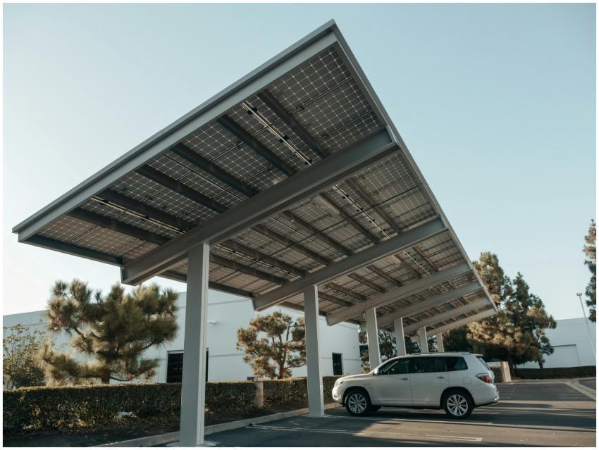 Solar panel carport in a modern urban setting, sho