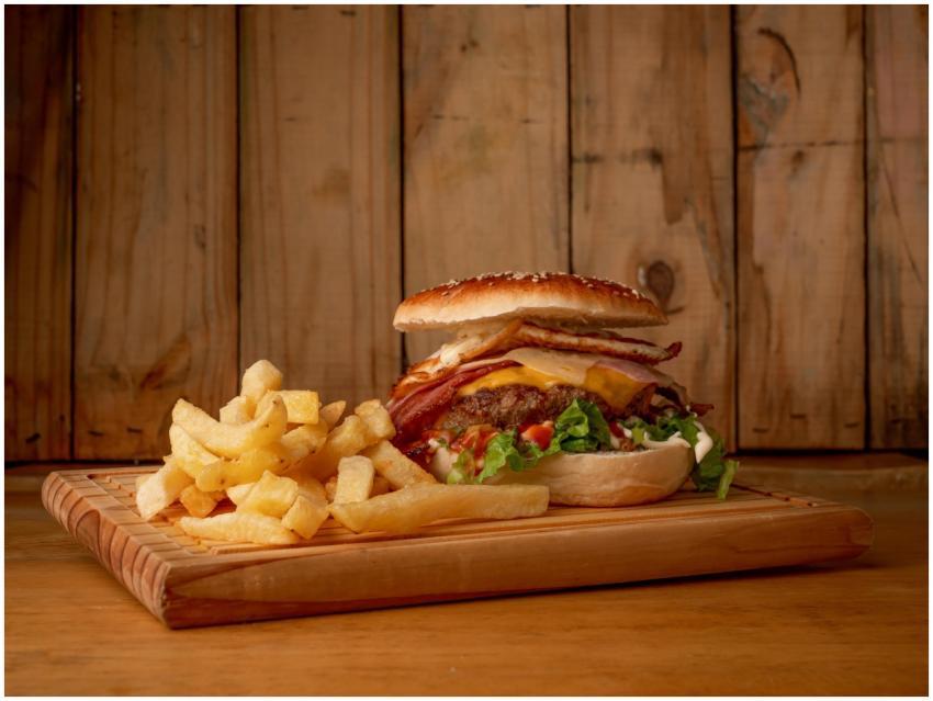 Mouth-watering cheeseburger with bacon, lettuce, a