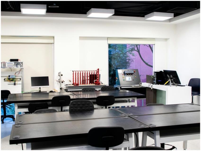 Contemporary lab interior with desks and equipment