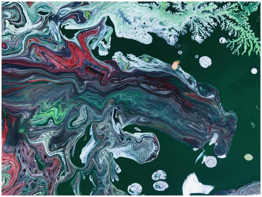 Vivid and vibrant abstract acrylic paint swirl wit