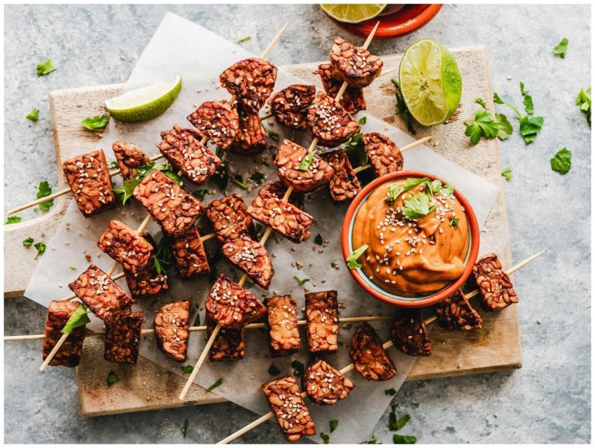 Appetizing grilled tempeh skewers paired with a ri