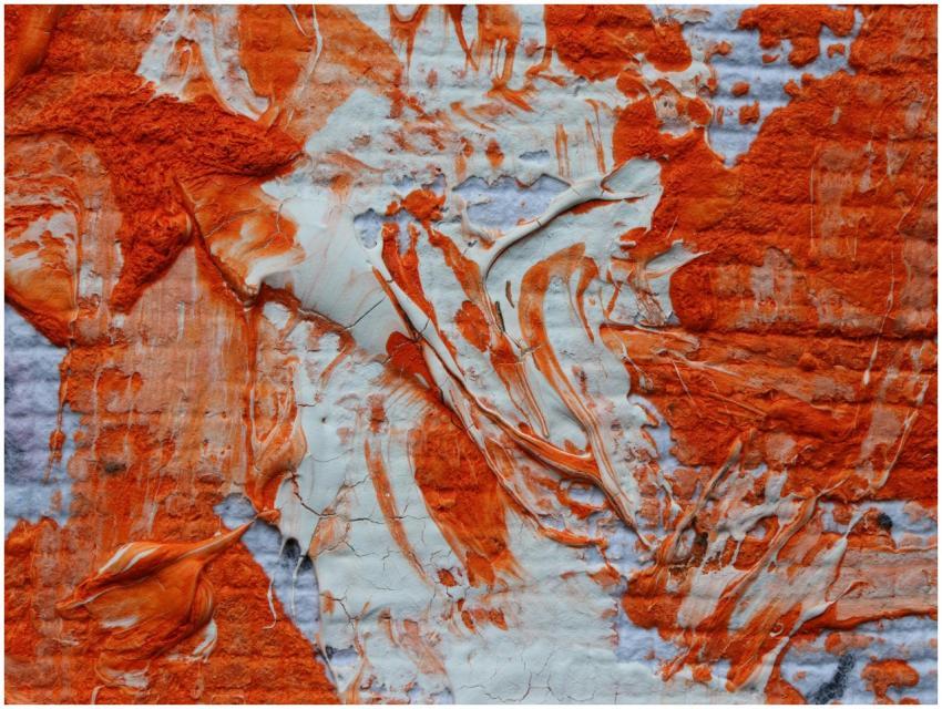 Detailed close-up of an abstract painting with ora