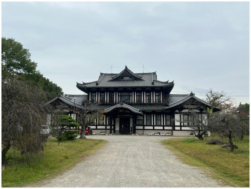 Front view of a historic Japanese building in Yama