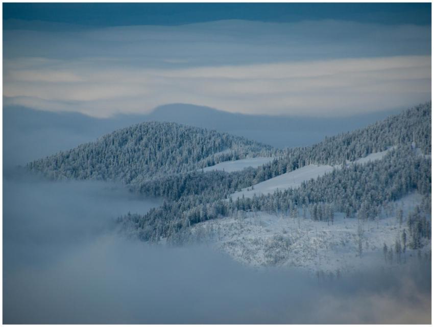 A breathtaking view of snow-covered mountains with