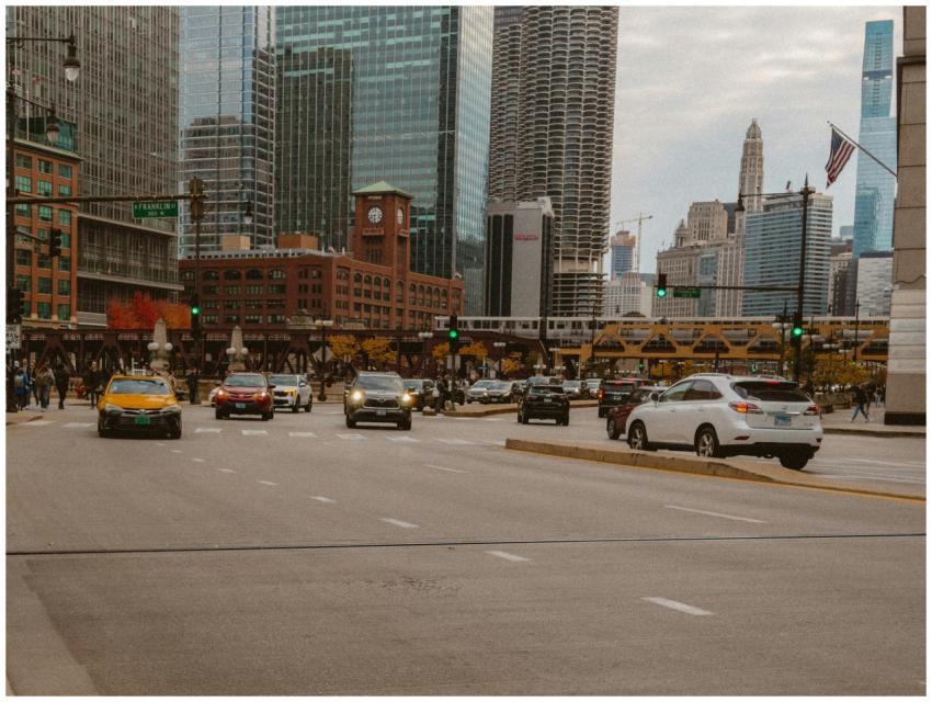 Bustling Chicago street with cars and skyscrapers