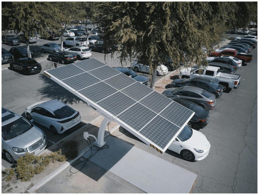 Electric cars charging at a solar-powered station