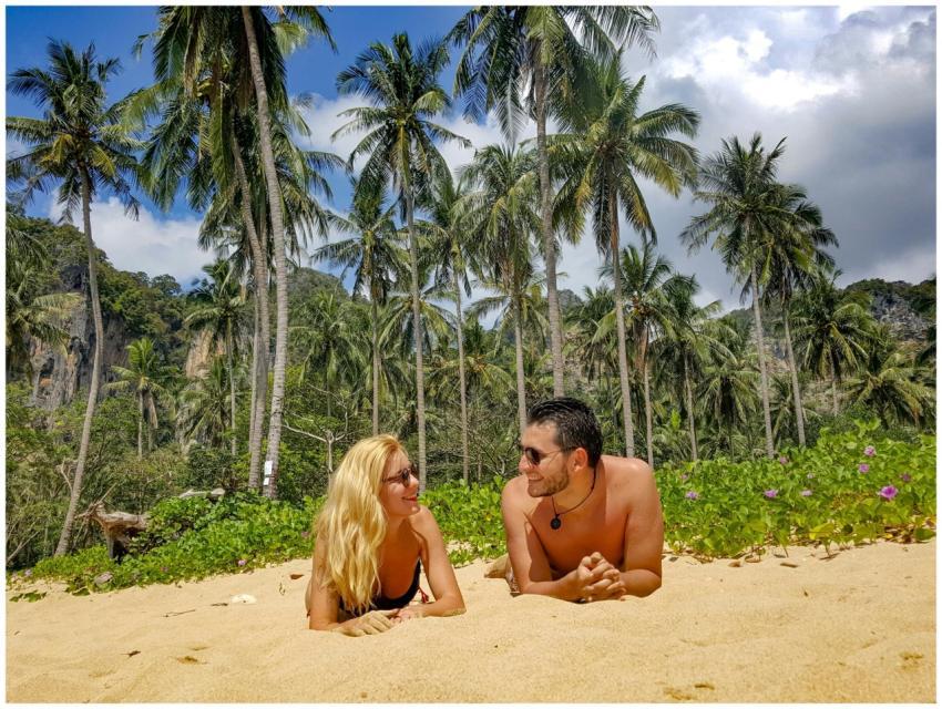 Couple enjoying a sunny day on a picturesque beach