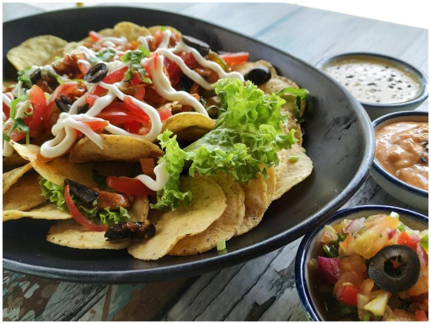 Mouth-watering nachos with fresh salsa, cheese, an