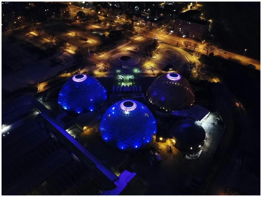 Stunning aerial night view of glowing glass domes
