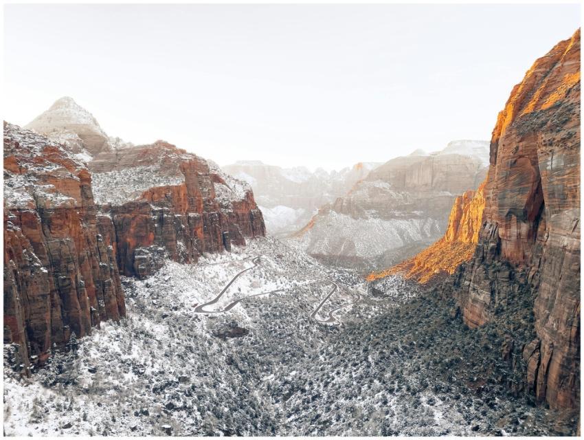 Scenic winter view of snow-dusted cliffs and valle