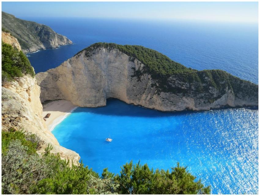 A breathtaking view of Navagio Beach with azure wa