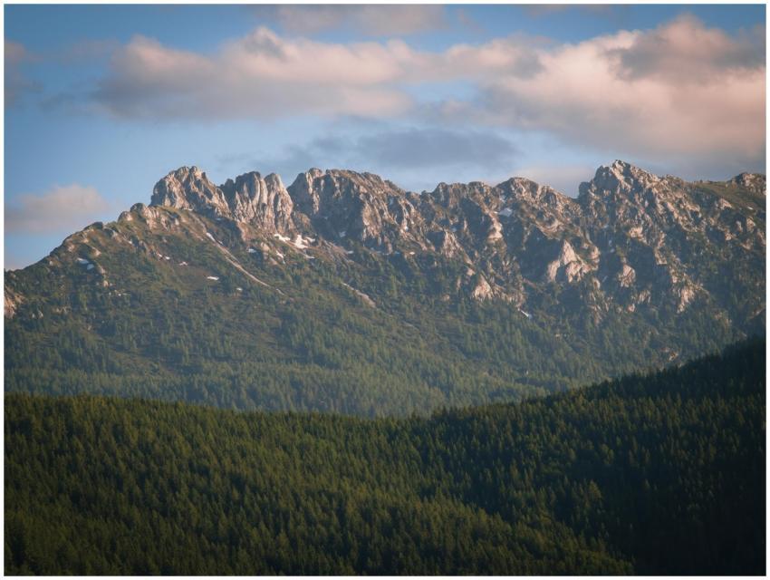 Beautiful view of an Alpine mountain range with lu