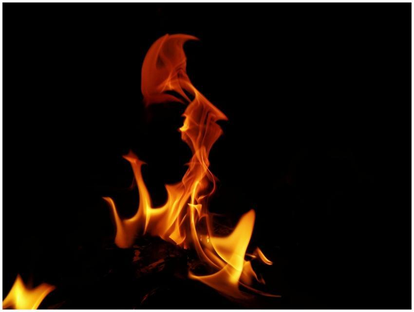 Vibrant flames dancing in the dark, showcasing the