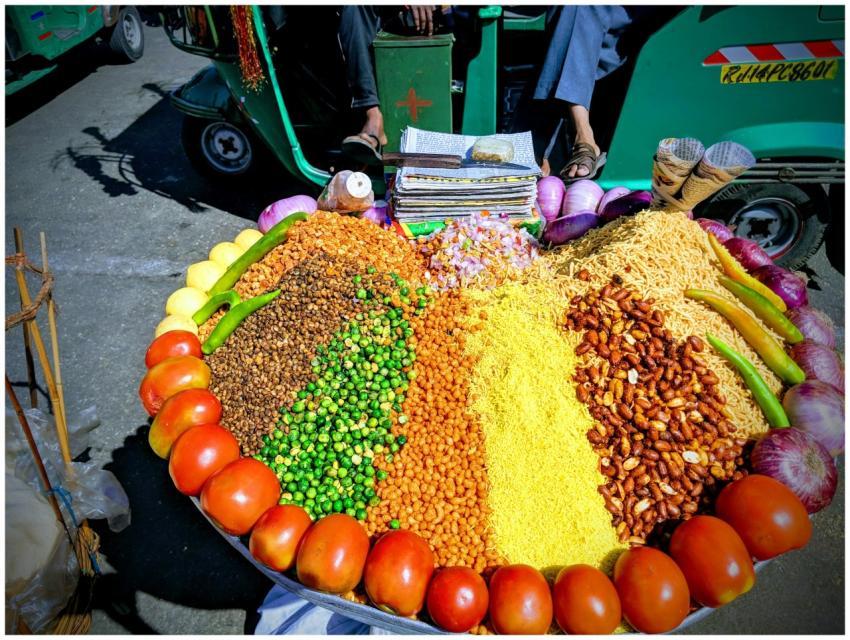 Vibrant street food display at a market in Jaipur