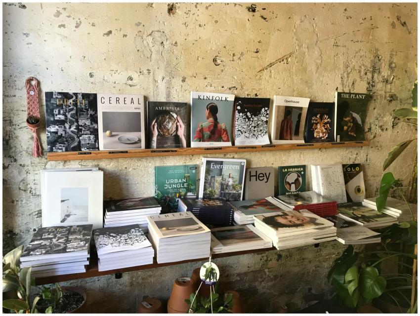 Rustic bookstore with magazines, books, and indoor