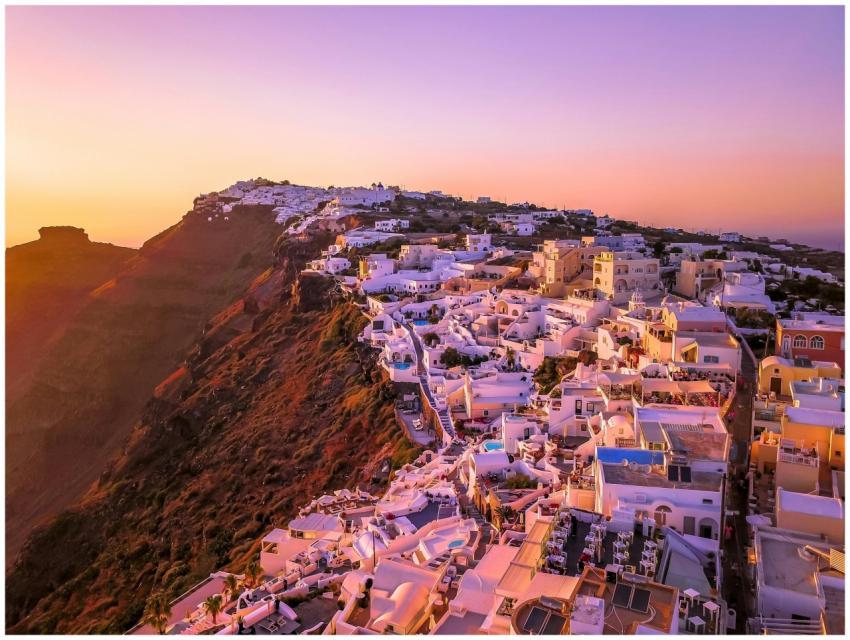 A breathtaking aerial view of Santorini at sunset