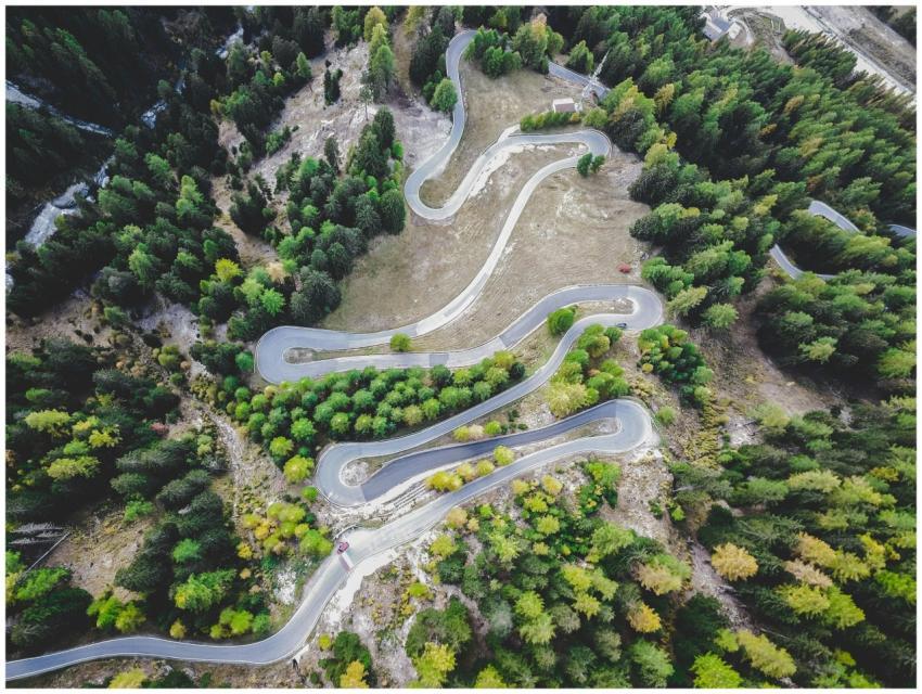 Scenic aerial view of a winding road through lush