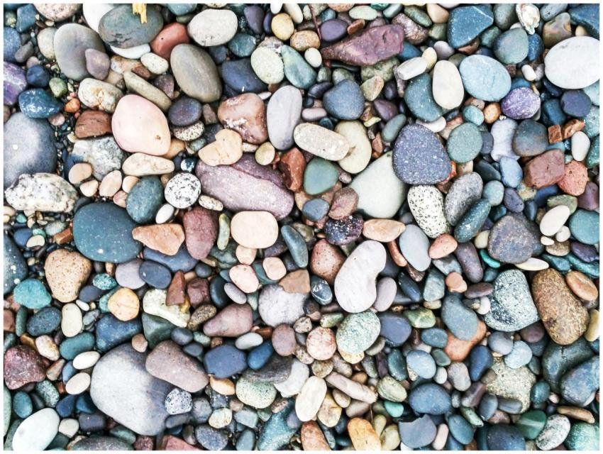 Vibrant collection of smooth, multicolored pebbles