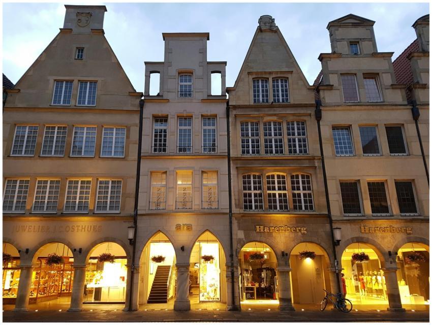 Charming historic buildings with arches and shops