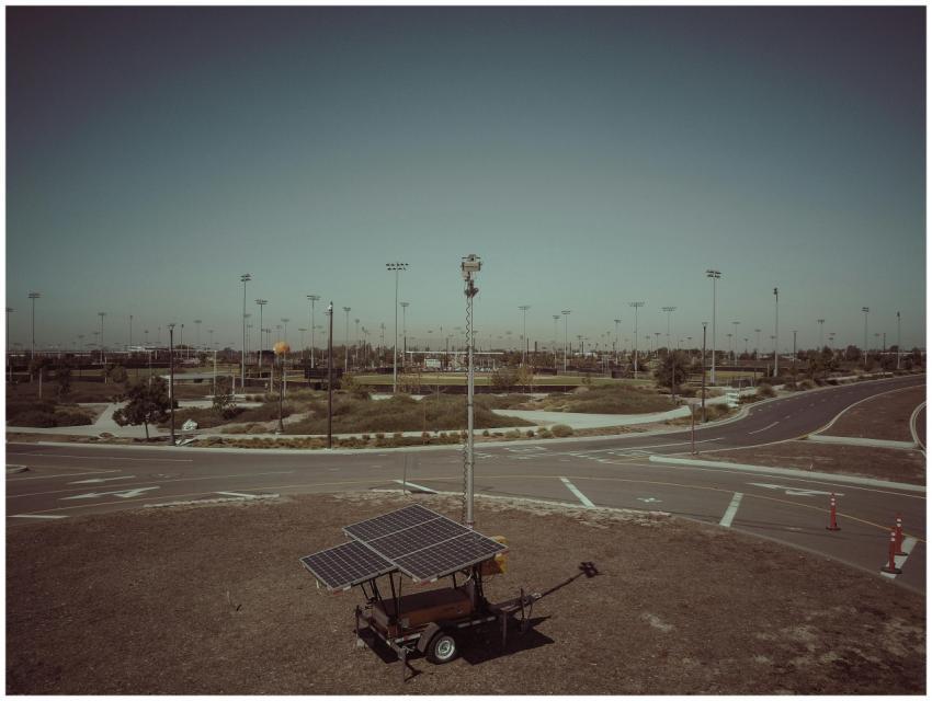 A mobile solar power unit in an open field area ca