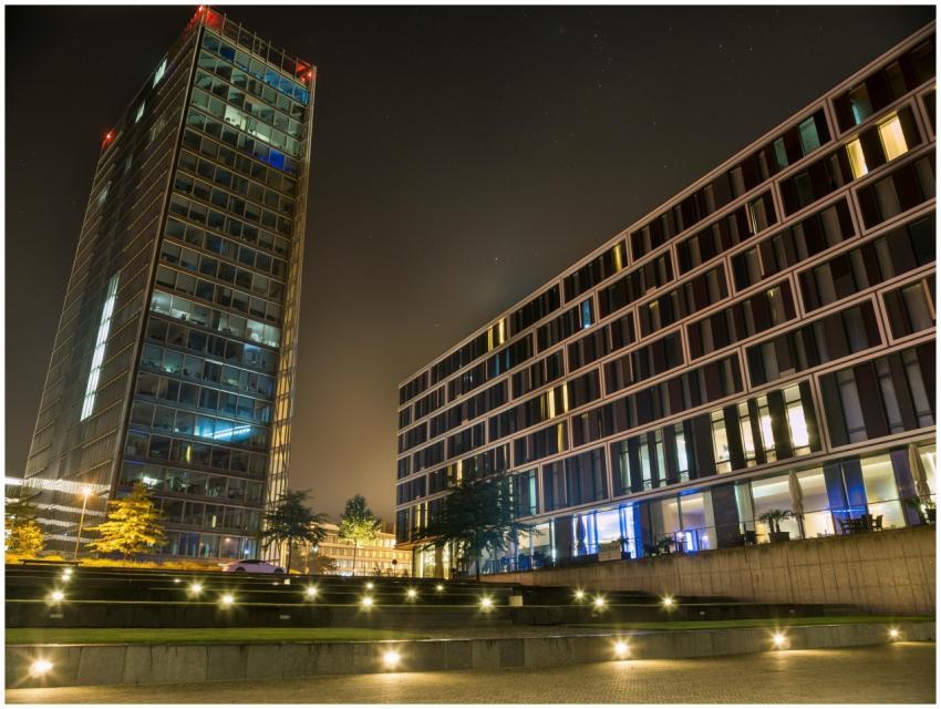 A stunning view of modern buildings illuminated at