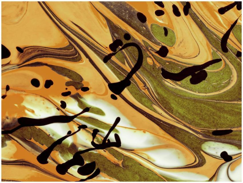 Dynamic abstract paint swirl featuring green and o