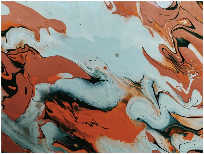 Dynamic abstract painting with swirling red and bl