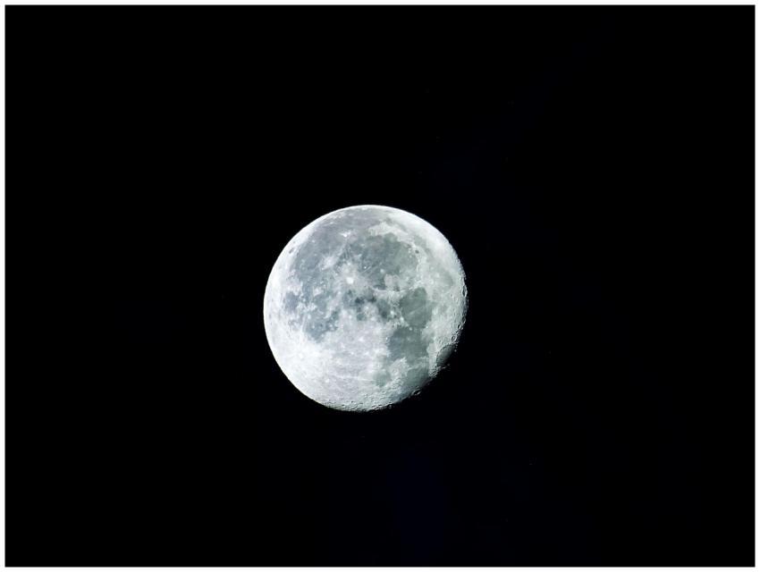 High-resolution image of the full moon against a d