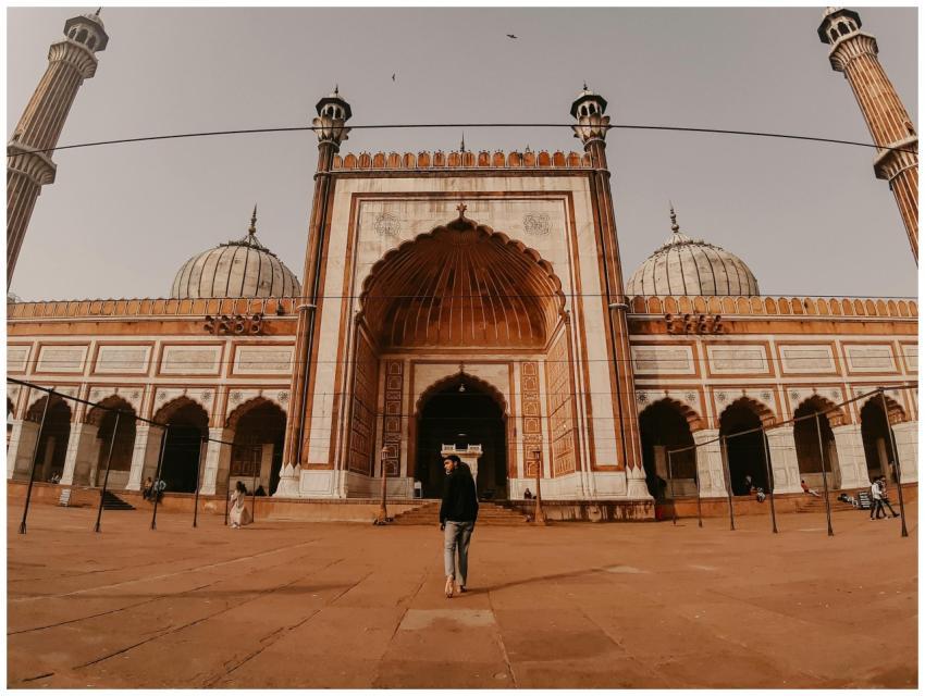 Low angle view of Jama Masjid with minarets at sun