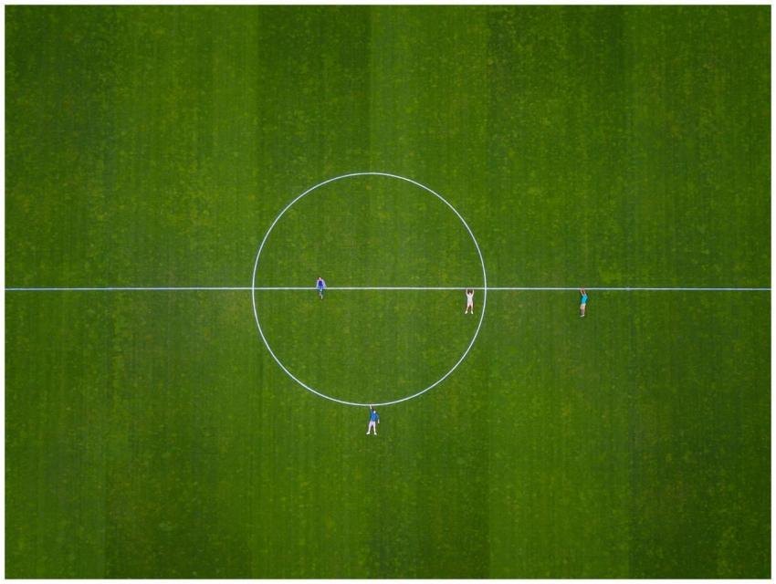 Aerial shot of people on a soccer field in Luzern,