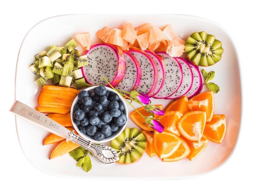 Vibrant tropical fruit platter with dragon fruit a