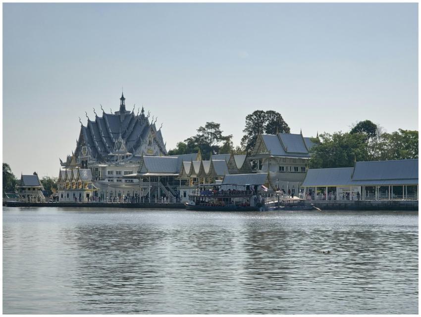 Beautiful riverside temple with traditional Thai a