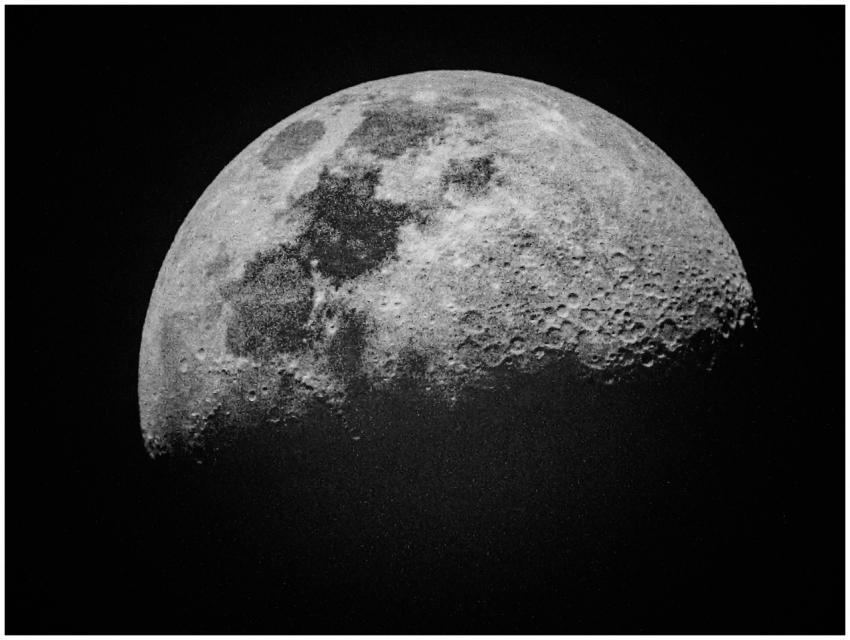 Detailed black and white photo of the moon's surfa