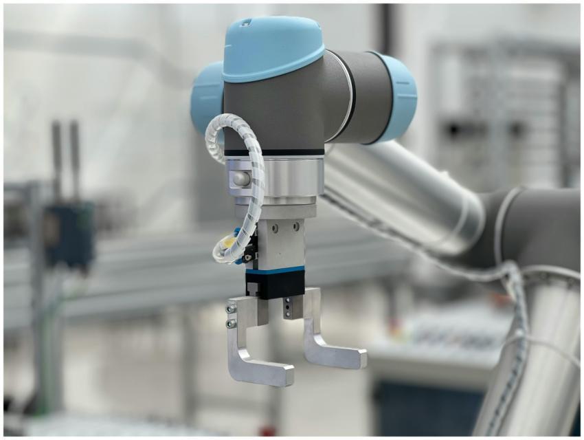 Close-up of a robotic arm in a modern industrial e