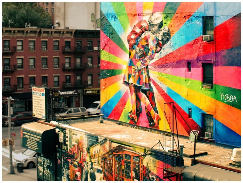 Vibrant street art mural depicting a classic embra