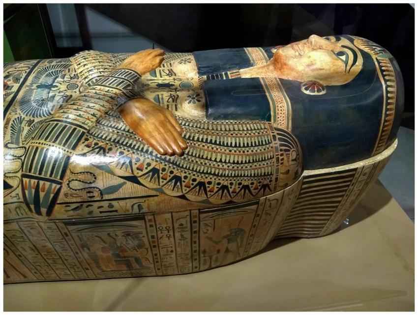 Ancient Egyptian sarcophagus with ornate hieroglyp