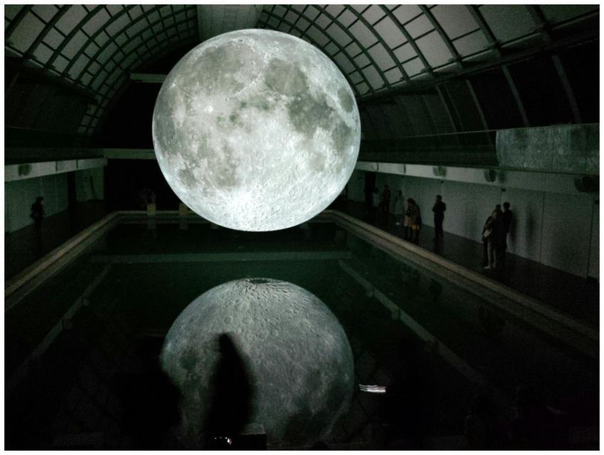 Mesmerizing moon installation reflected in water i