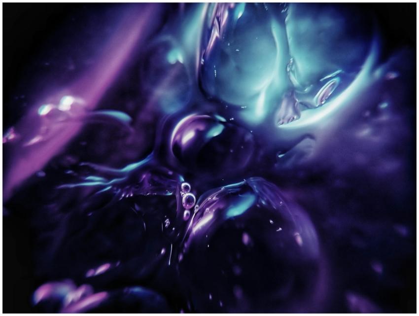 A vivid abstract image with flowing purple and blu
