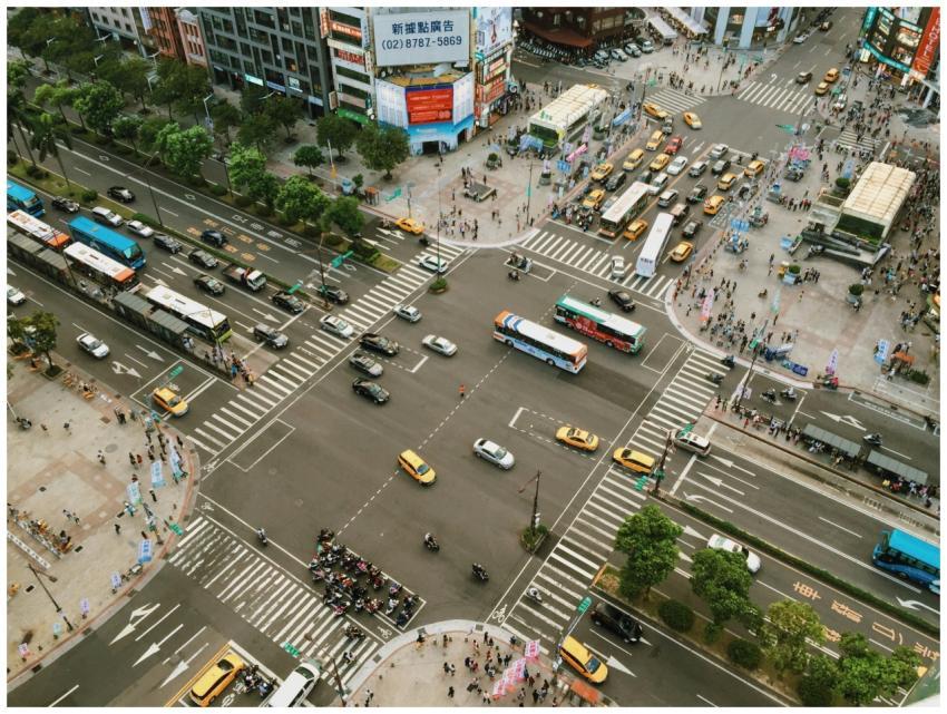 Aerial view showcasing busy city street life with