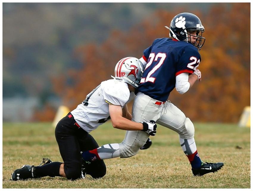 Two athletes in action during an intense outdoor A