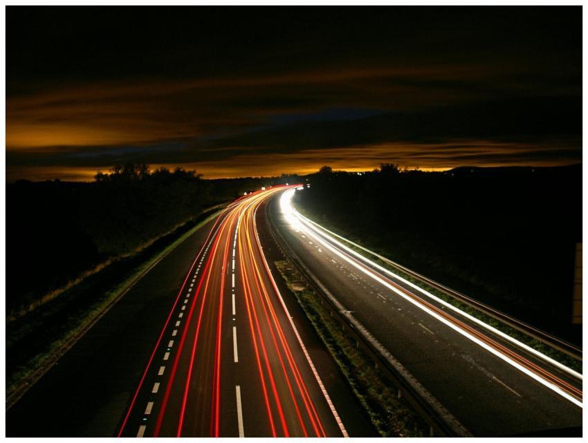 Captivating long exposure photo of a highway at ni