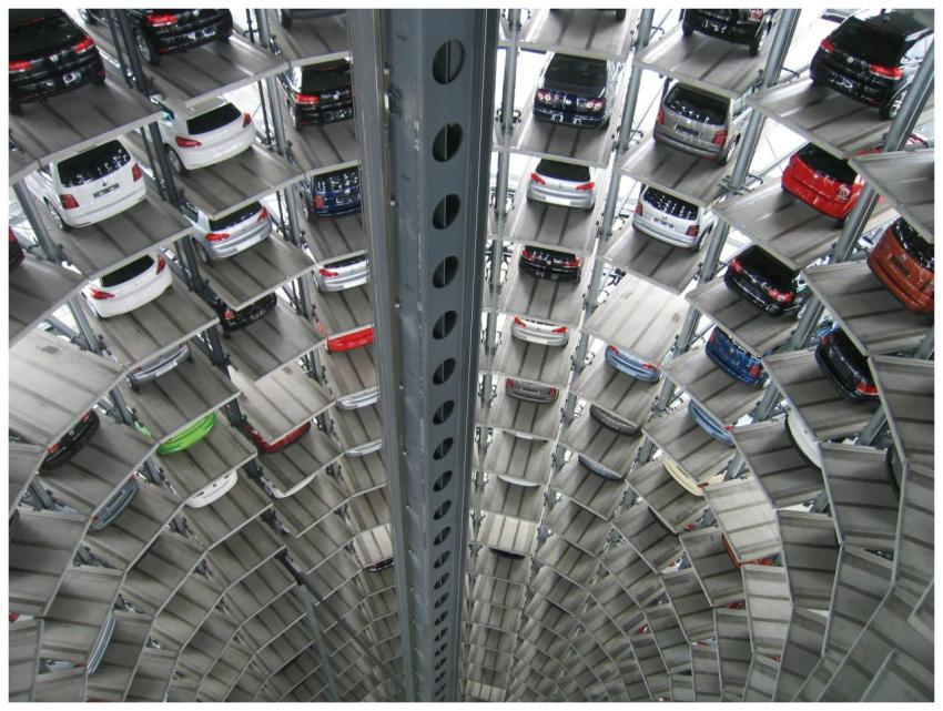 A vertical view of a spiral multi-storey car park