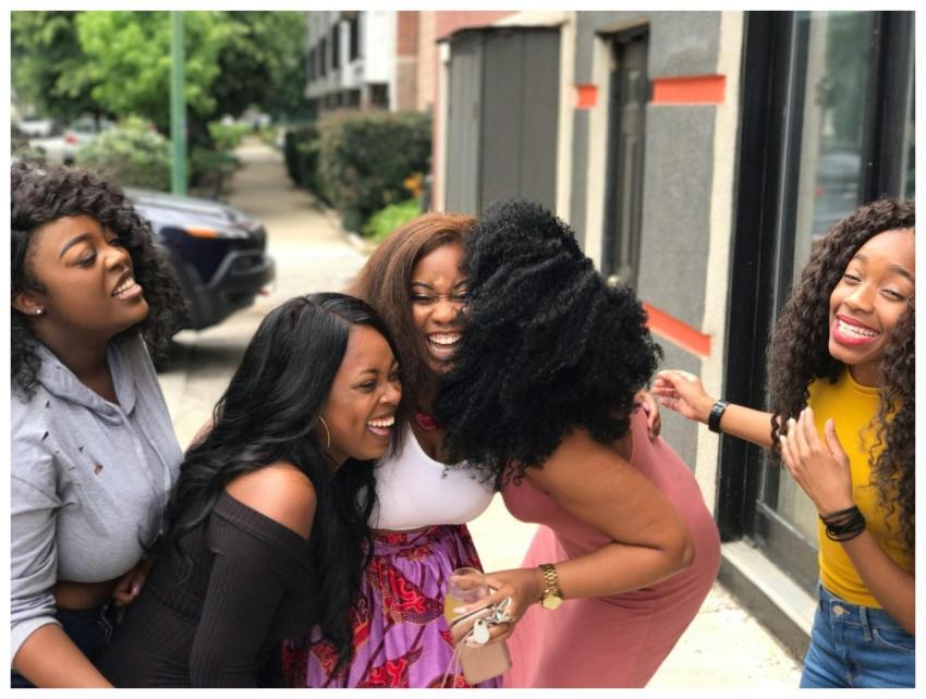 A joyful group of friends sharing a moment of laug