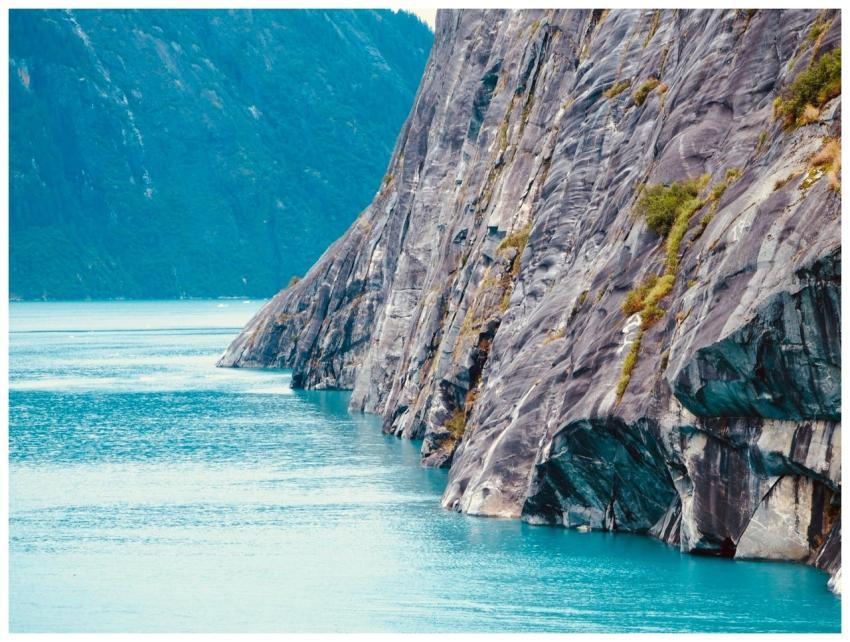 Majestic Alaskan lake with striking rocky cliffs a