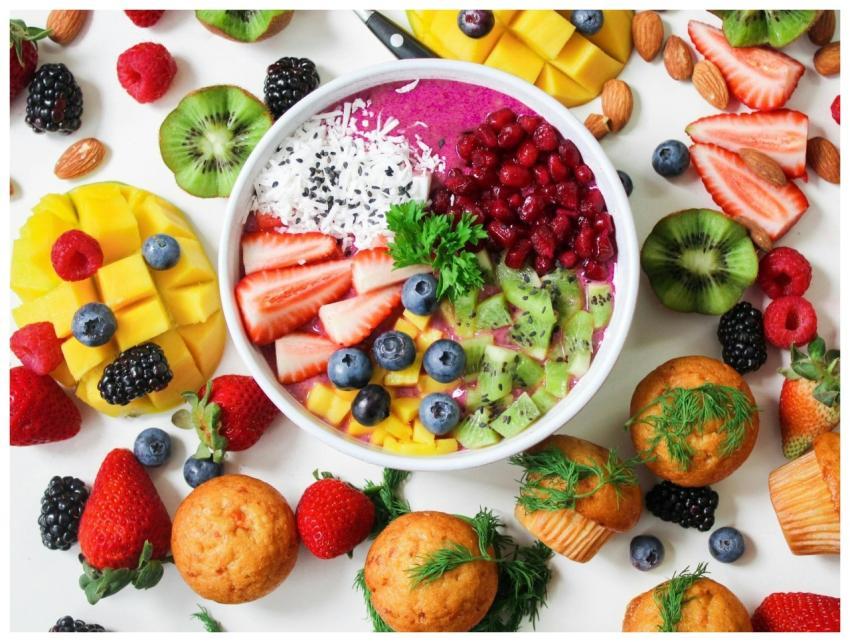 Vibrant smoothie bowl topped with assorted fresh f