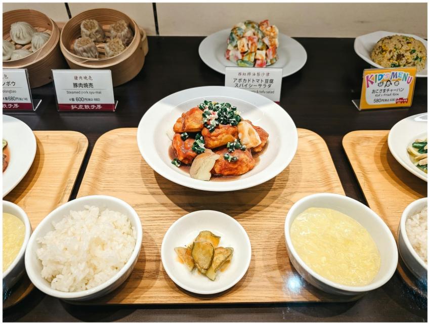 A variety of Asian dishes elegantly presented on w