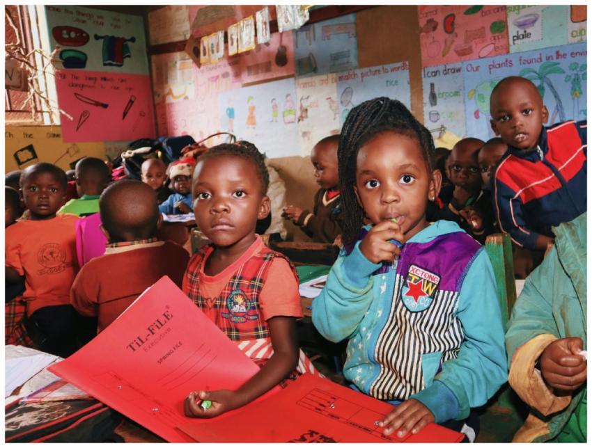 A group of young children engaged in an educationa